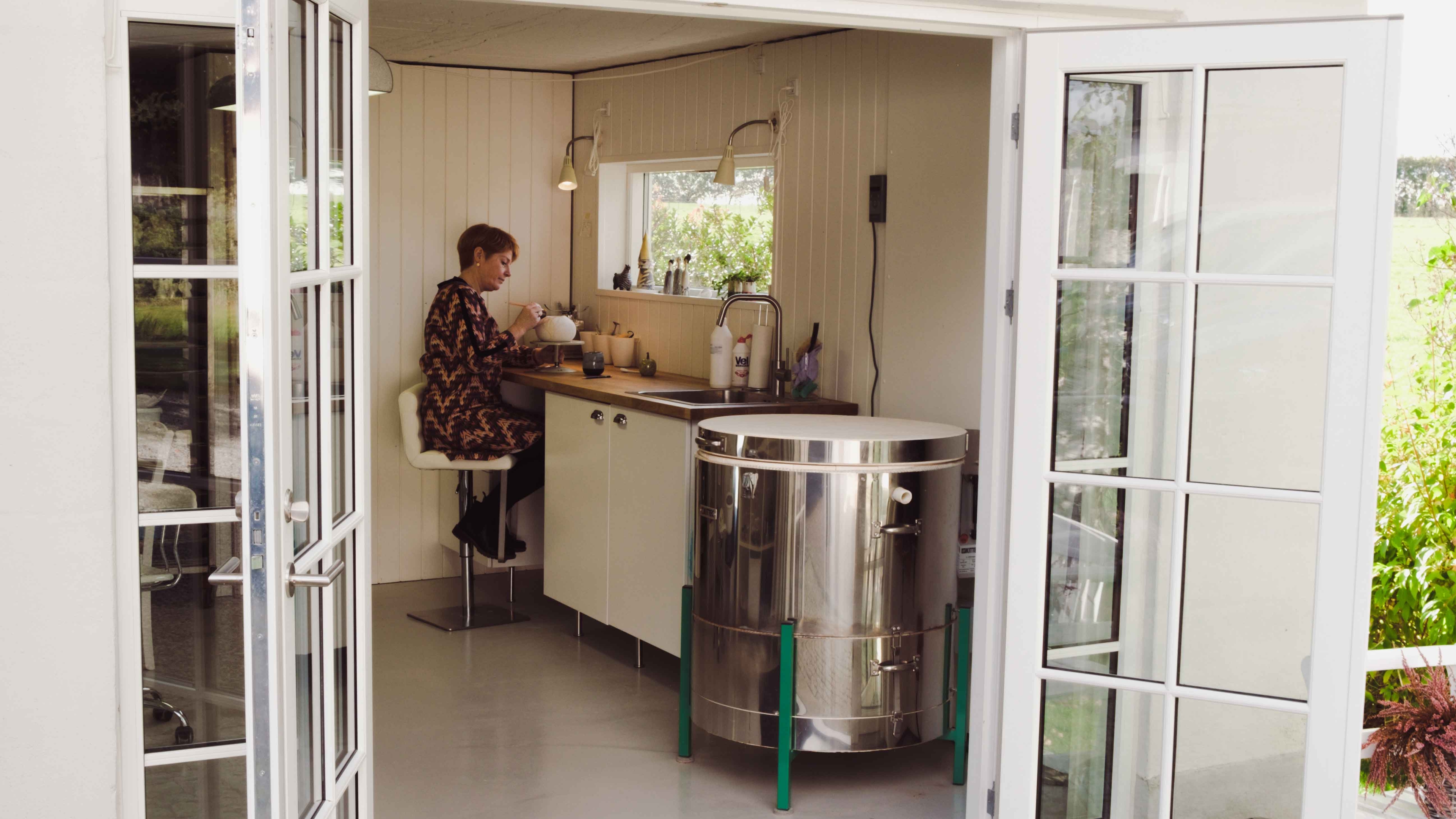 A double door opened into the ceramics workspace